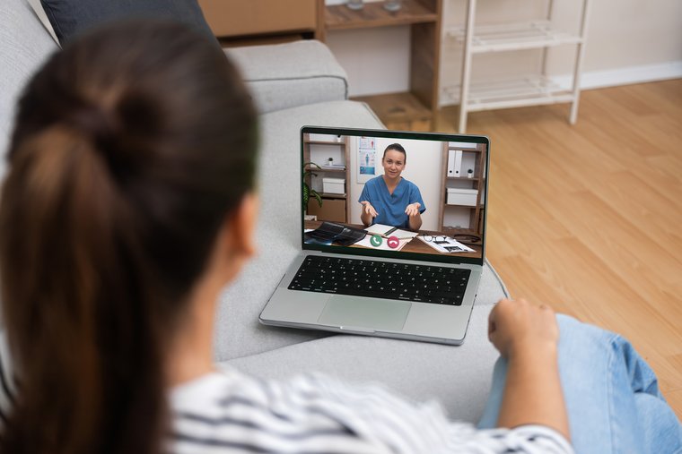 Patient on a telehealth video call with a clinician